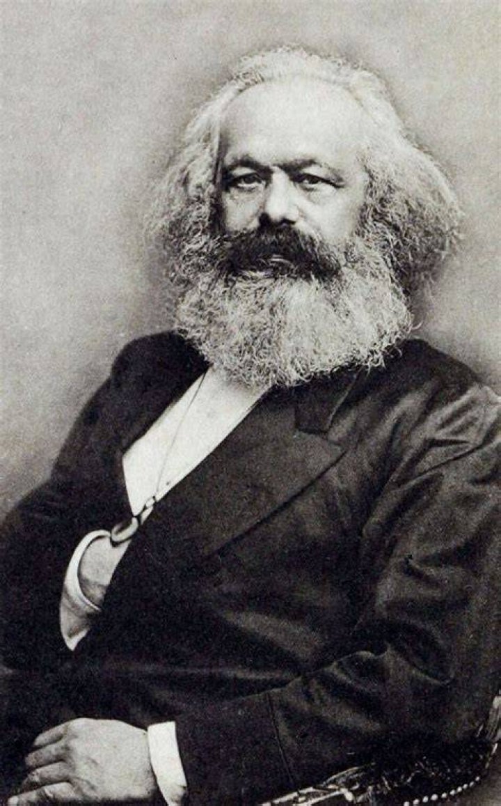 What did Karl Marx believe about revolution?